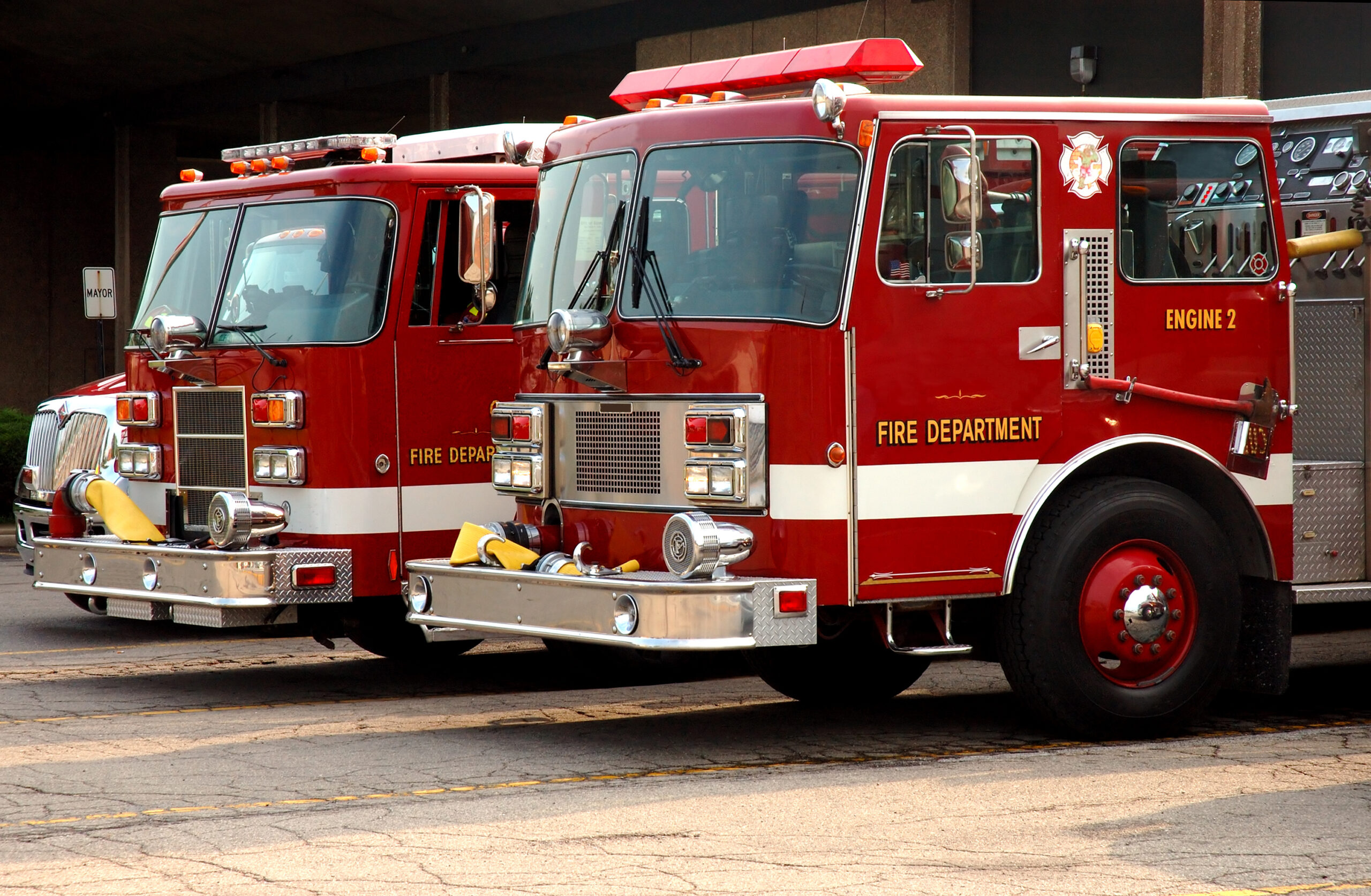 Fire trucks parked outside of station