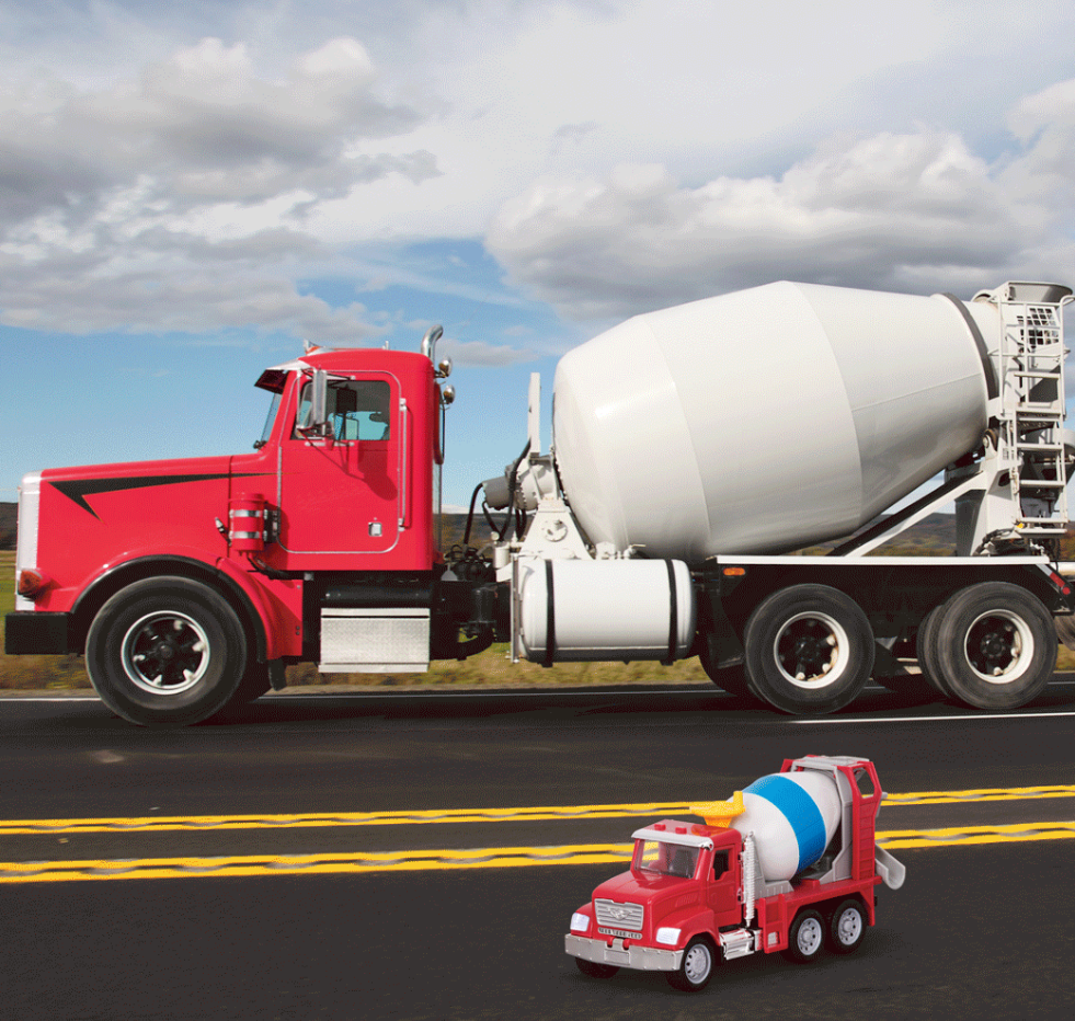 DRIVEN toy cement mixer in front of real cement truck